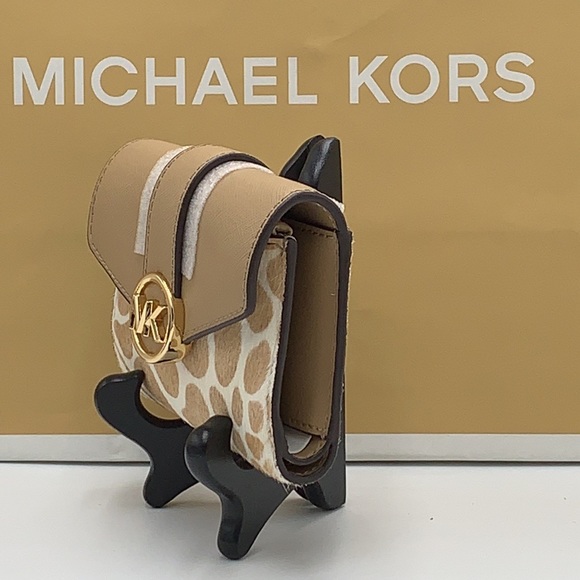 MICHAEL KORS
Carmen Medium Flap Bifold Faux Fur-Leather Wallet
Camel color - Picture 9 of 15